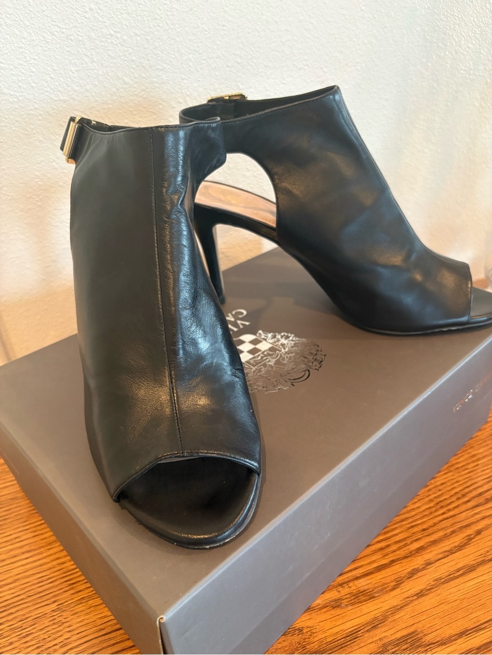 Vince Camuto Black Leather Peep-Toe Cutout Ankle Booties with Gold Buckle